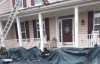 Roofsimple working on roof installing new roofing system for Lane Dezan