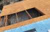 Roofsimple working on roof installing new roofing system for Tim Ivins 