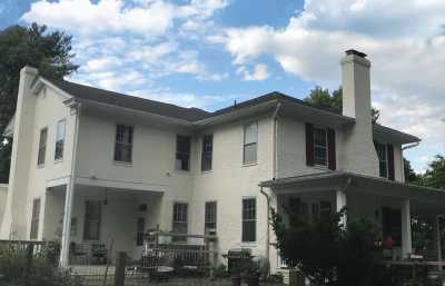 Roofsimple installing new roofing system for Carla Giacomangeli