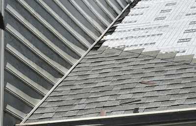 Roofsimple installing new roofing system for Dennis Woomer