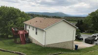 Roofsimple installing new roofing system for Patrick E