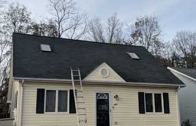 Roofsimple installing new roofing system for Kevin F