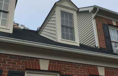 Roofsimple working on roof installing new roofing system for Jennifer Bowden