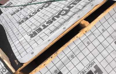 Roofsimple working on roof installing new roofing system for Doug Williams