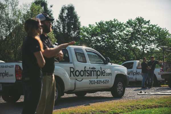 Roofing contractor working on a roof