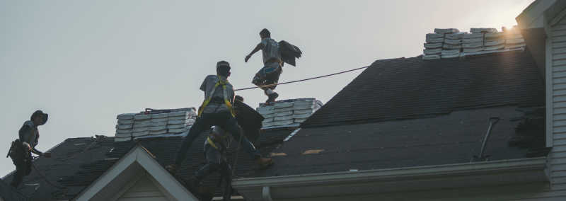 Roofsimple contractors installing a roof