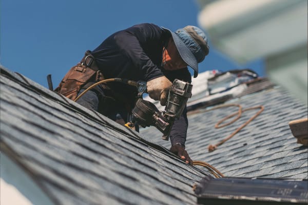 Man working on roof