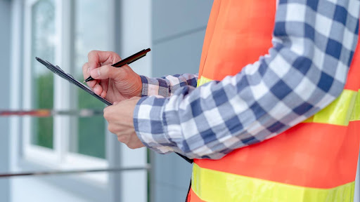 roofing contractor conducting an inspection checklist