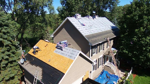 Licensed roofers installing a new roof
