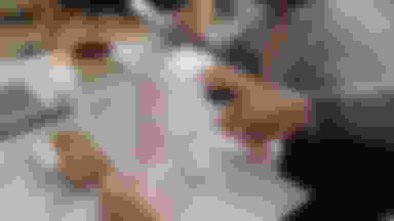 Man hand holding past due notice