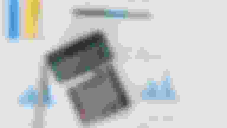 calculator on top of financial docs