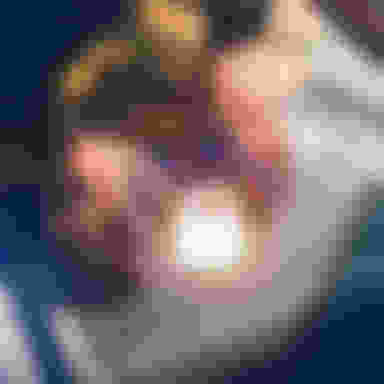 Hands using a laptop keyboard with a padlock image over it.