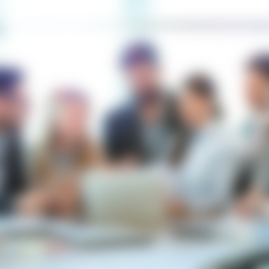 Group of businesspeople reviewing documents