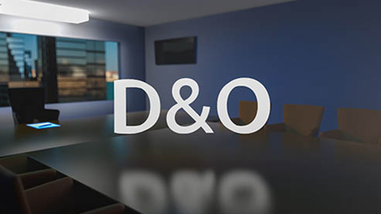 A meeting room with desks and chairs.