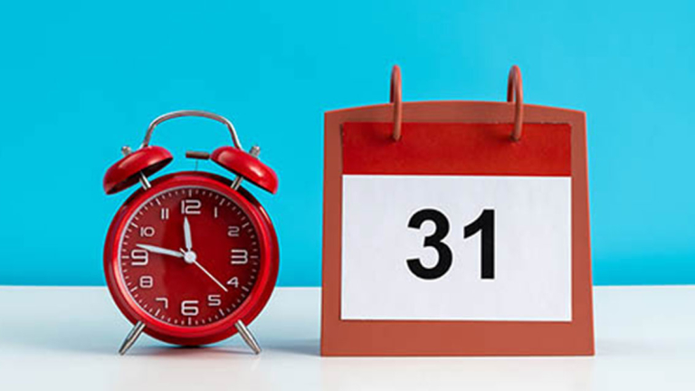 An alarm clock and a calendar.