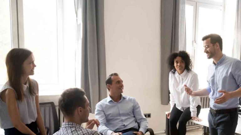 A group of people in an office collaborating