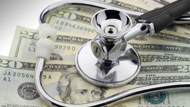 A stethoscope on 20 dollar bills.