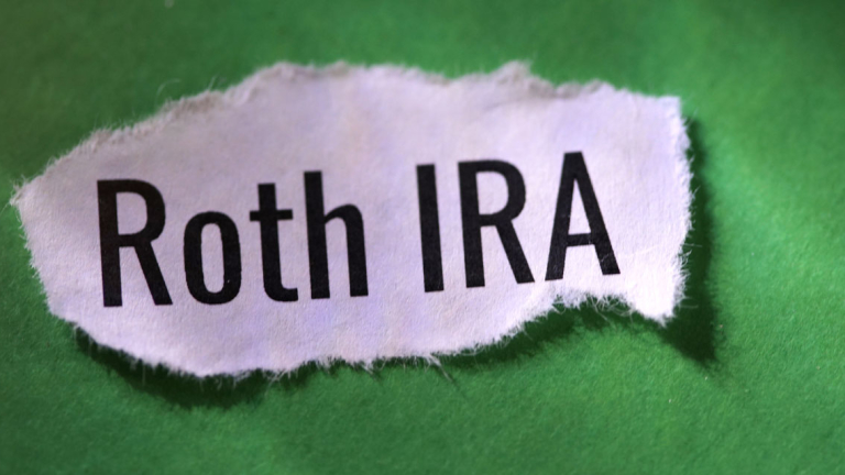 A torn piece of paper that says Roth IRA.