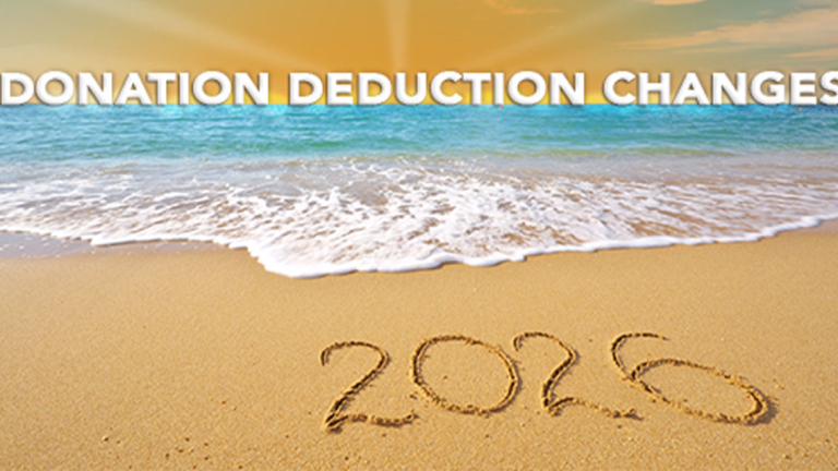 A beach with 2026 written in the sand.