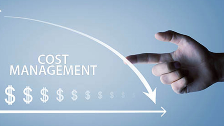 A finger pointing at a graph.