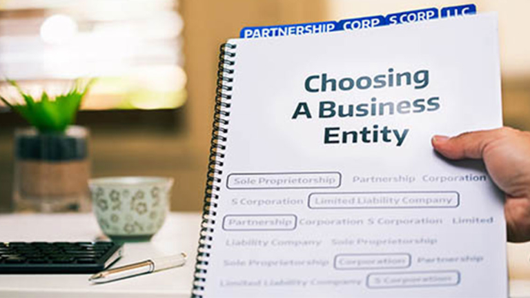 A spiral binder with business information.