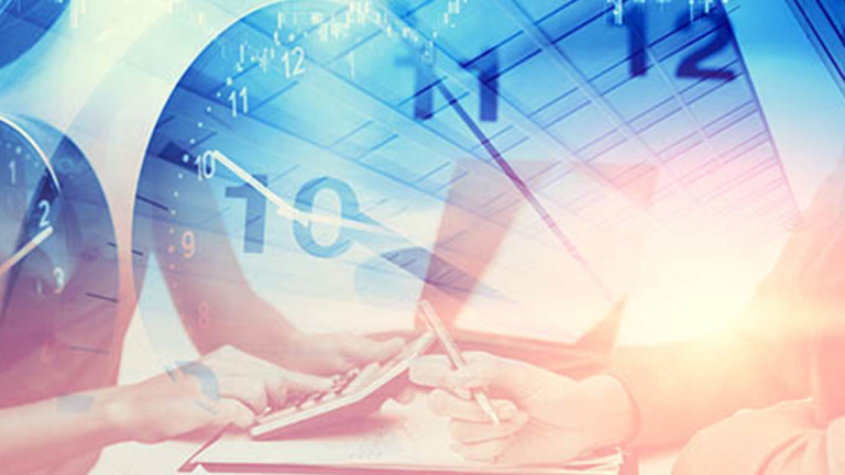 A clock, and people using a calculator and pen on paper.