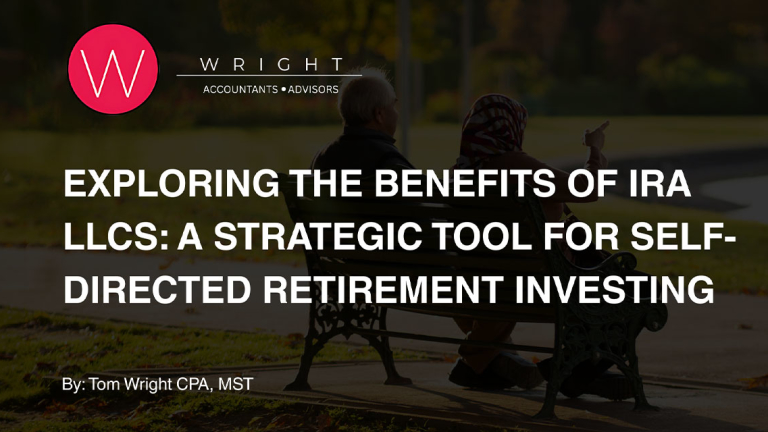 Two elderly people sitting on a park bench.