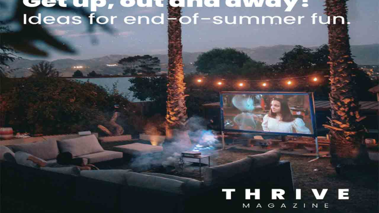outdoor patio with comfortable seating and a movie on TV