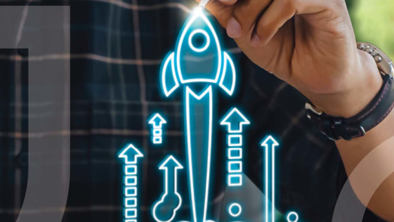 A man using a pen to illustrate a rocket ship using a tablet.