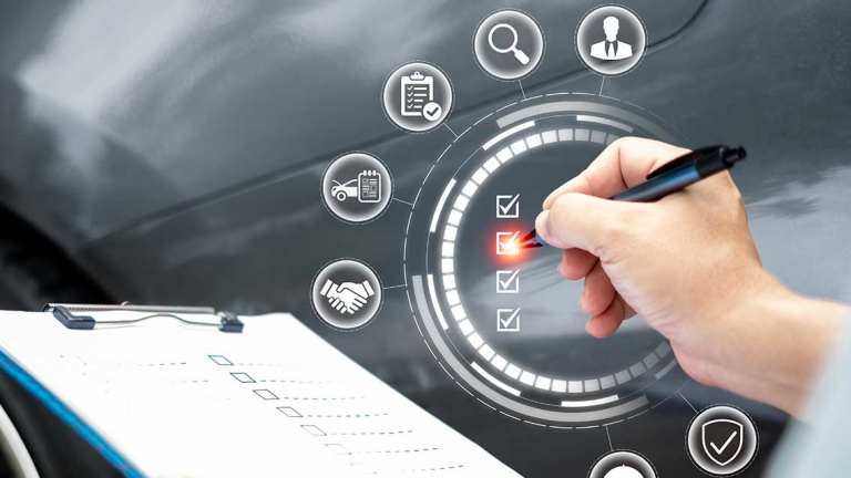 Someone holding a clip board and a pen.