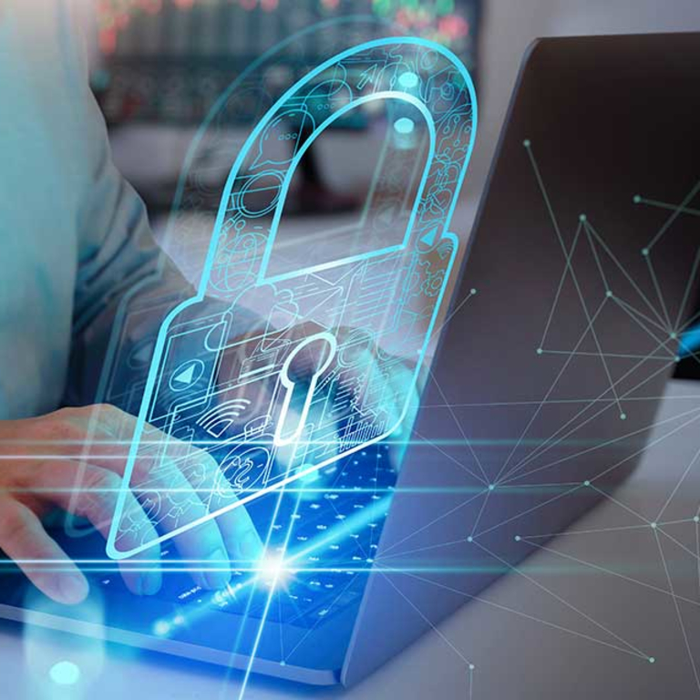 Hands on a laptop keyboard with a virtual lock.