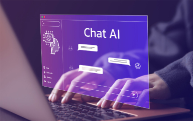 A person typing on an open laptop using Chat AI.