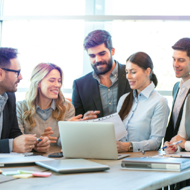 Group of businesspeople reviewing documents