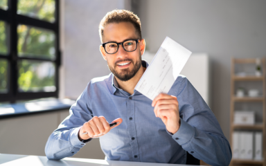 Man with payroll check