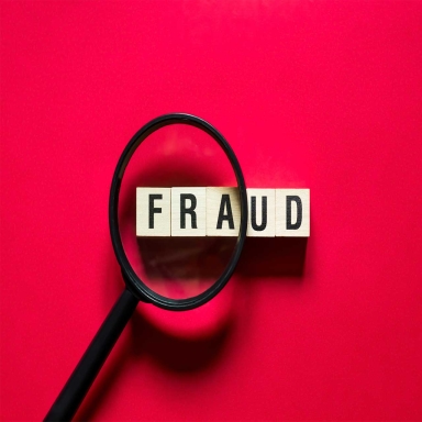Fraud word concept on cubes