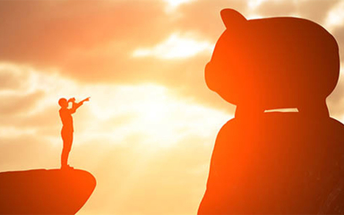 A man with binoculars looking at a giant piggy bank.