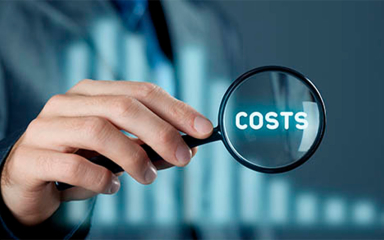 A hand holding a magnifying glass.