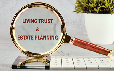 A magnifying glass resting on a calendar