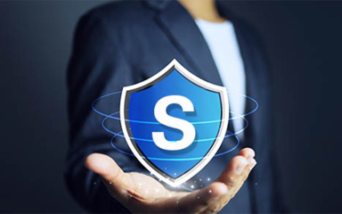 A shield hovering over a man's open hand.