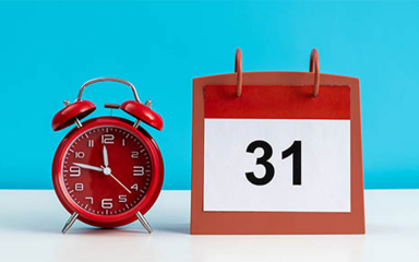 An alarm clock and calendar.