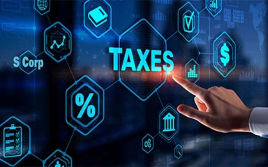 A touch display with the word taxes in the middle of a web of related tax symbols.