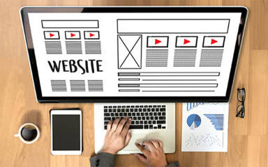 Computer, tablet, laptop, graph, cup of coffee and glasses.