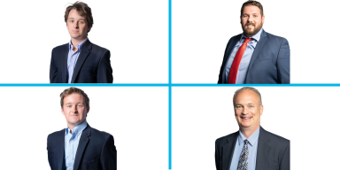 Four business professionals.