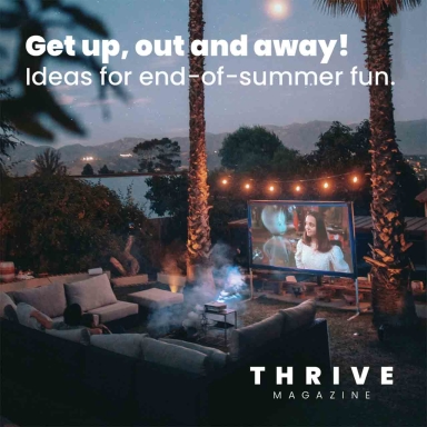 outdoor patio with comfortable seating and a movie on TV