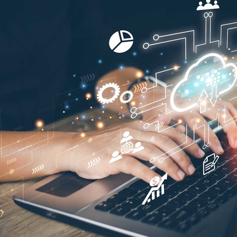 A person typing on a laptop.