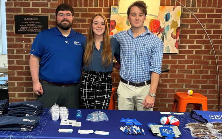 Tax Professionals at a booth at a conference