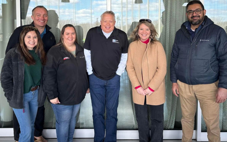 A group of business professionals braving the cold.