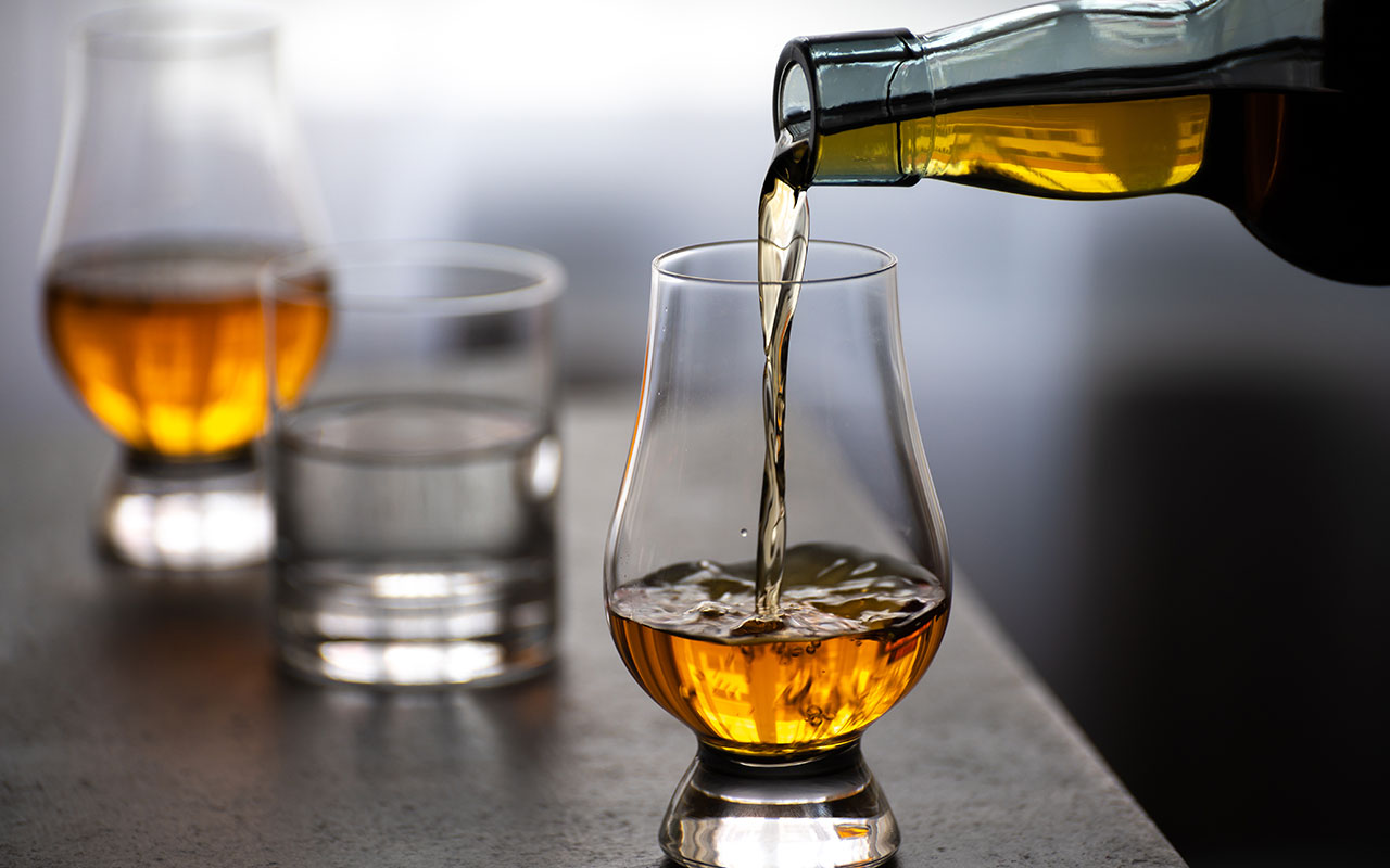 Liquor being poured into a glass