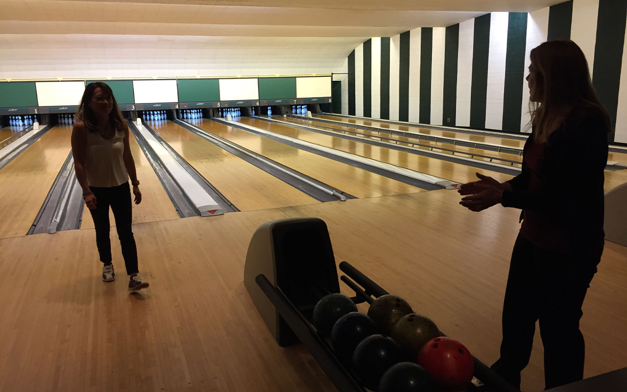 Two women bowling