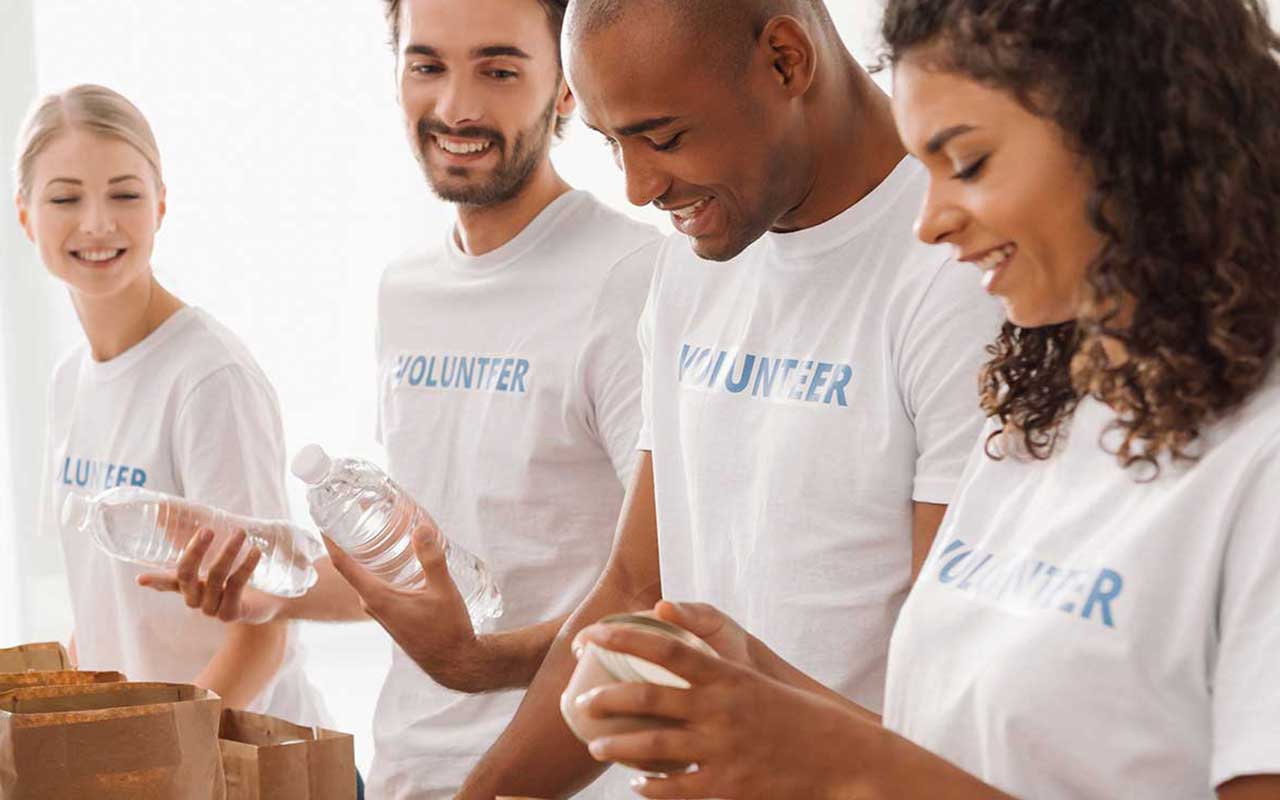 Four volunteer workers at a nonprofit organization